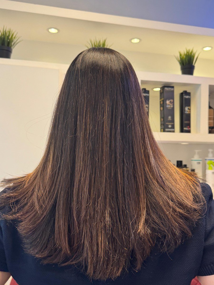 Hair colouring and highlights result at Azema hair salon JVC Dubai